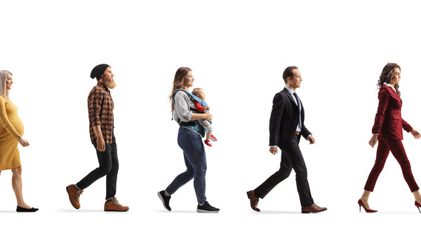 group of people walking, from a baby to a senior